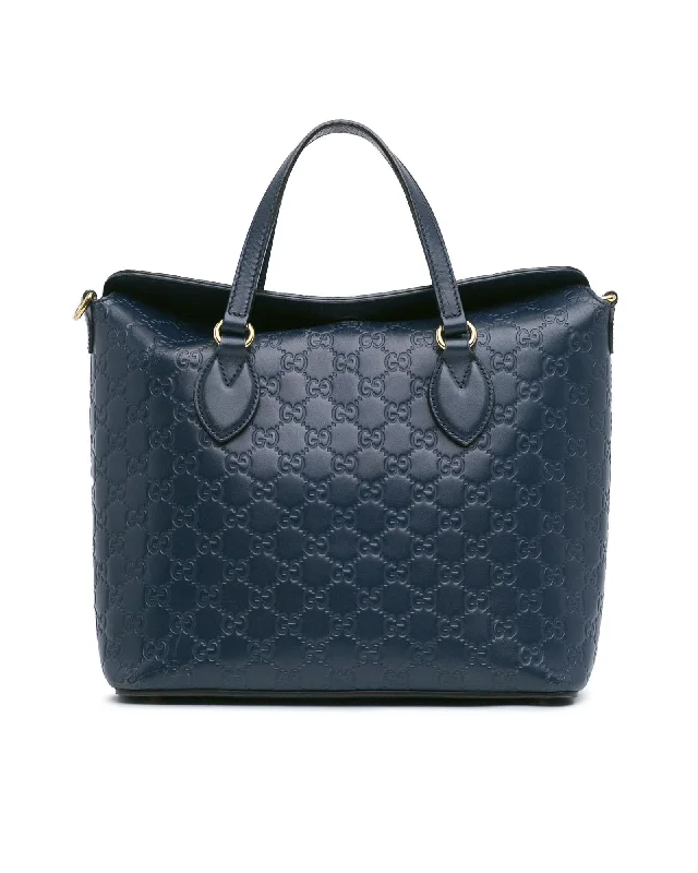 Embossed Leather Fold-Over Satchel with Magnetic Snap Closures